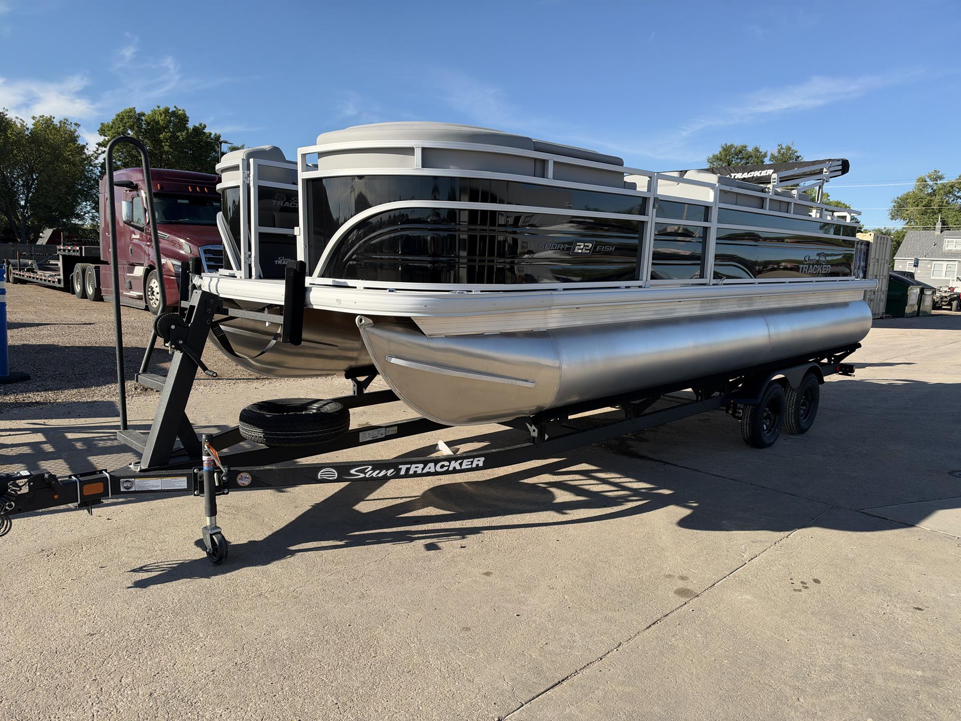 New 2026 Sun Tracker SportFish 22 DLX Power Boats Outboard in