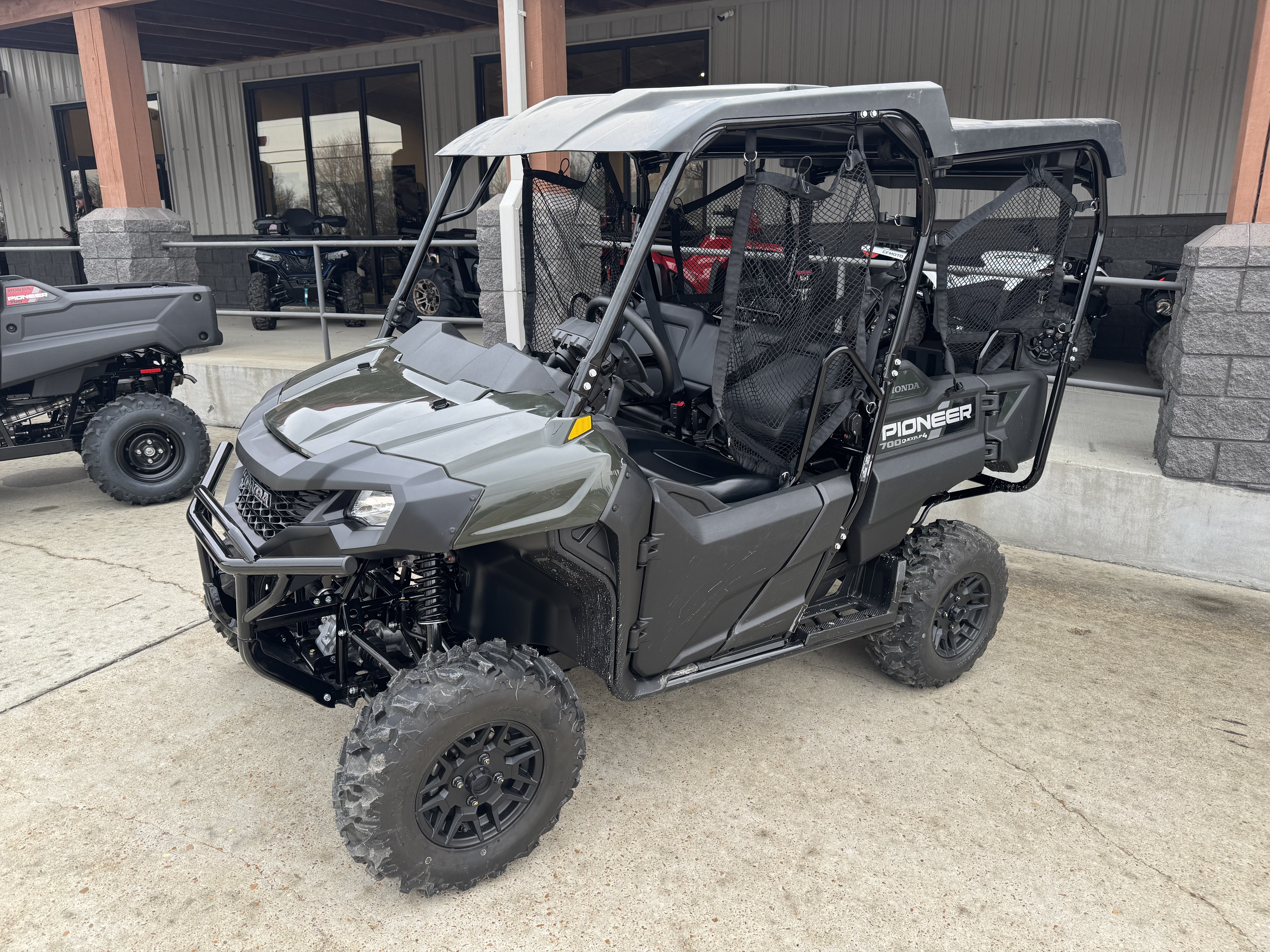 New 2026 Honda Pioneer 700-4 Deluxe Black Forest Green | Utility