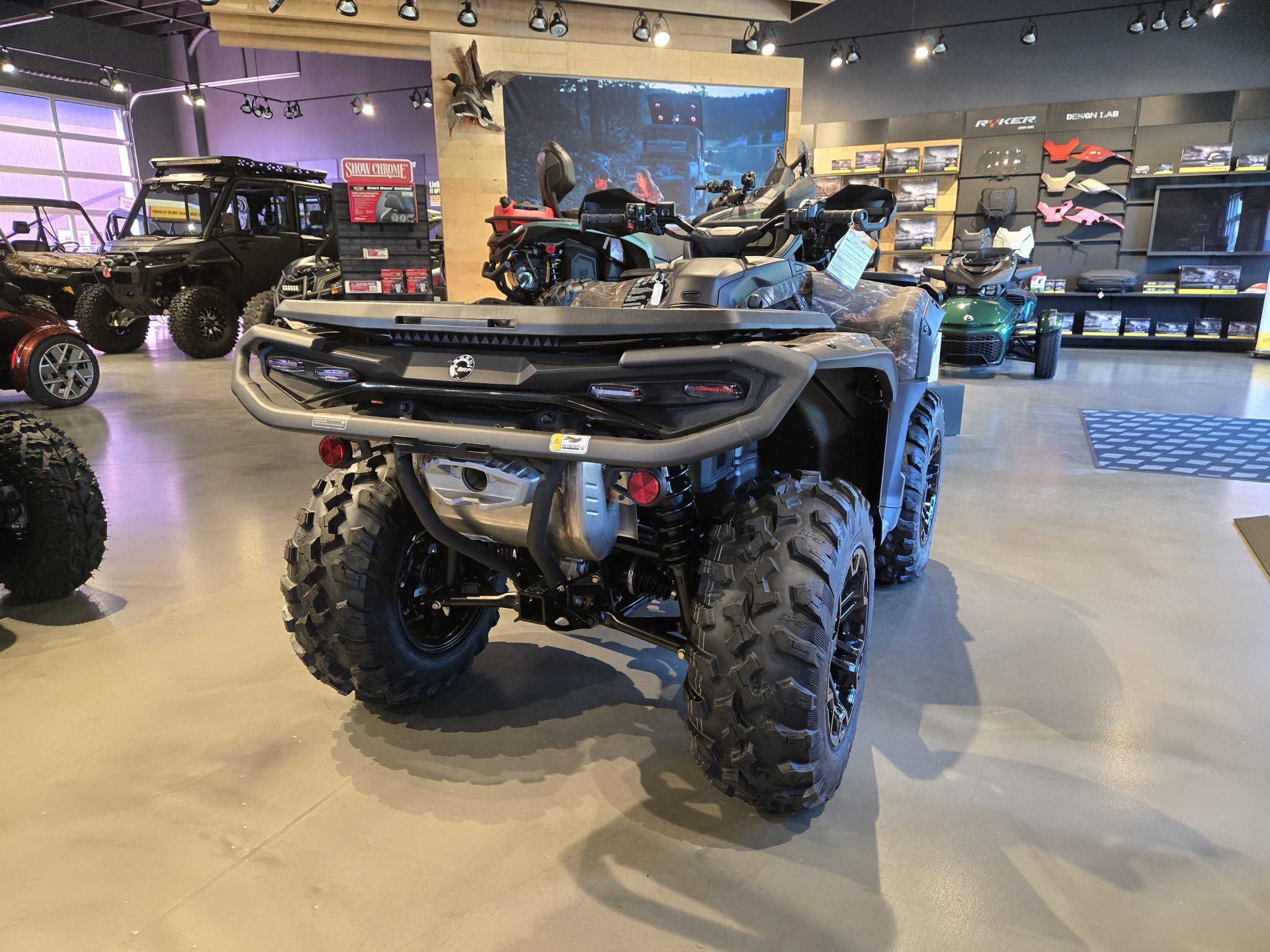 2026 Can-Am Outlander XT 1000R in Dark Wildland Camo — front three-quarter view