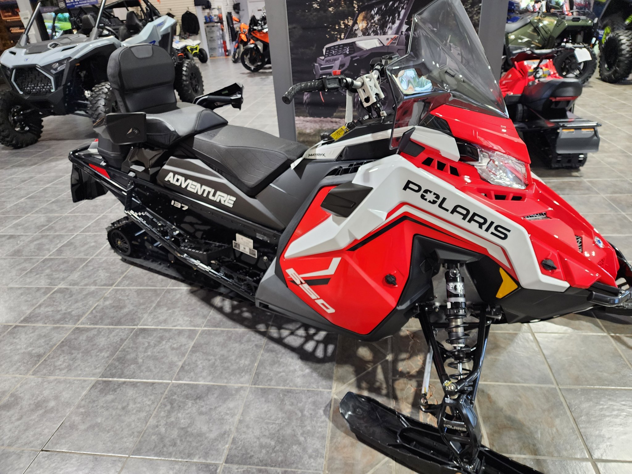 2027 Polaris 650 INDY Adventure 137 Indy Red 1.35 ES 1