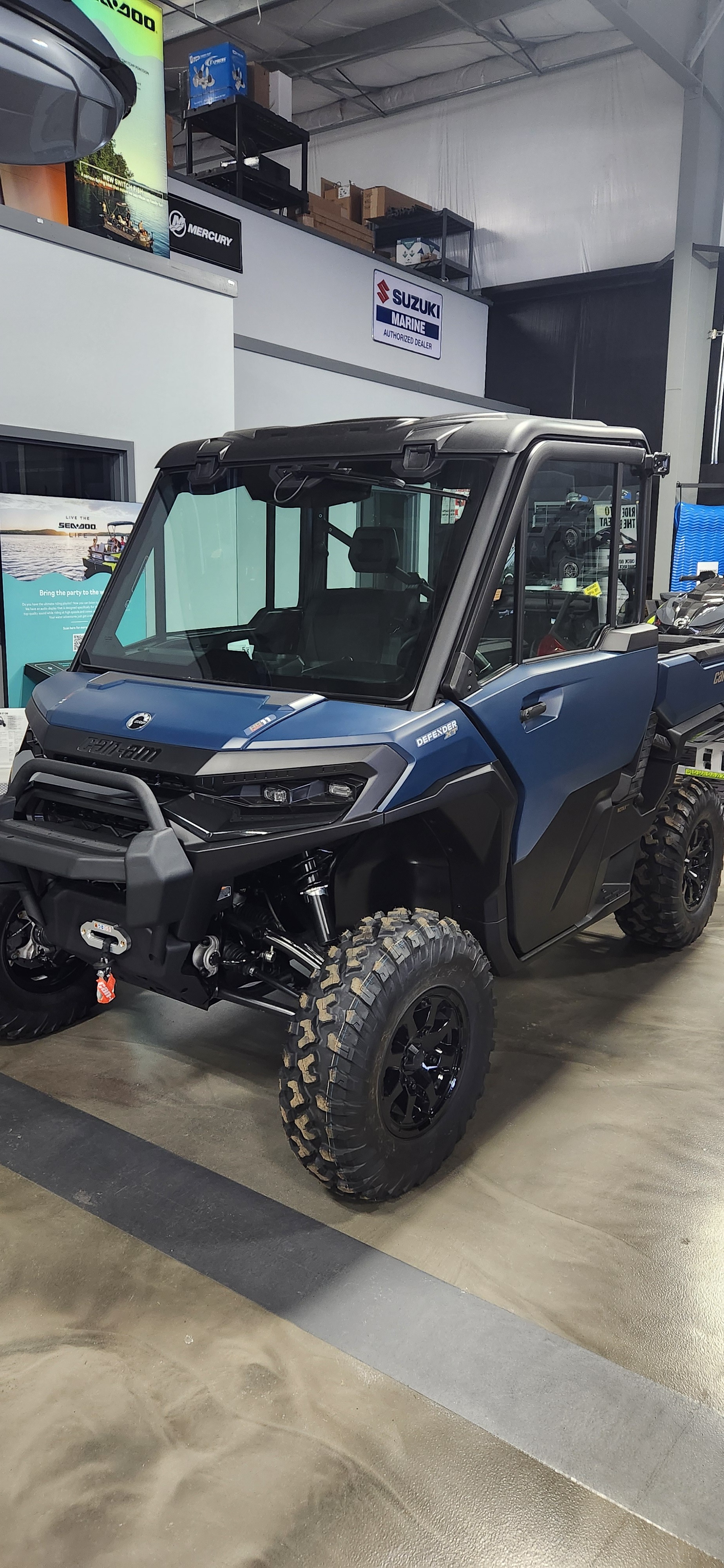 2026 Can-Am Defender XT CAB HD11 in Dusty Navy — front three-quarter view