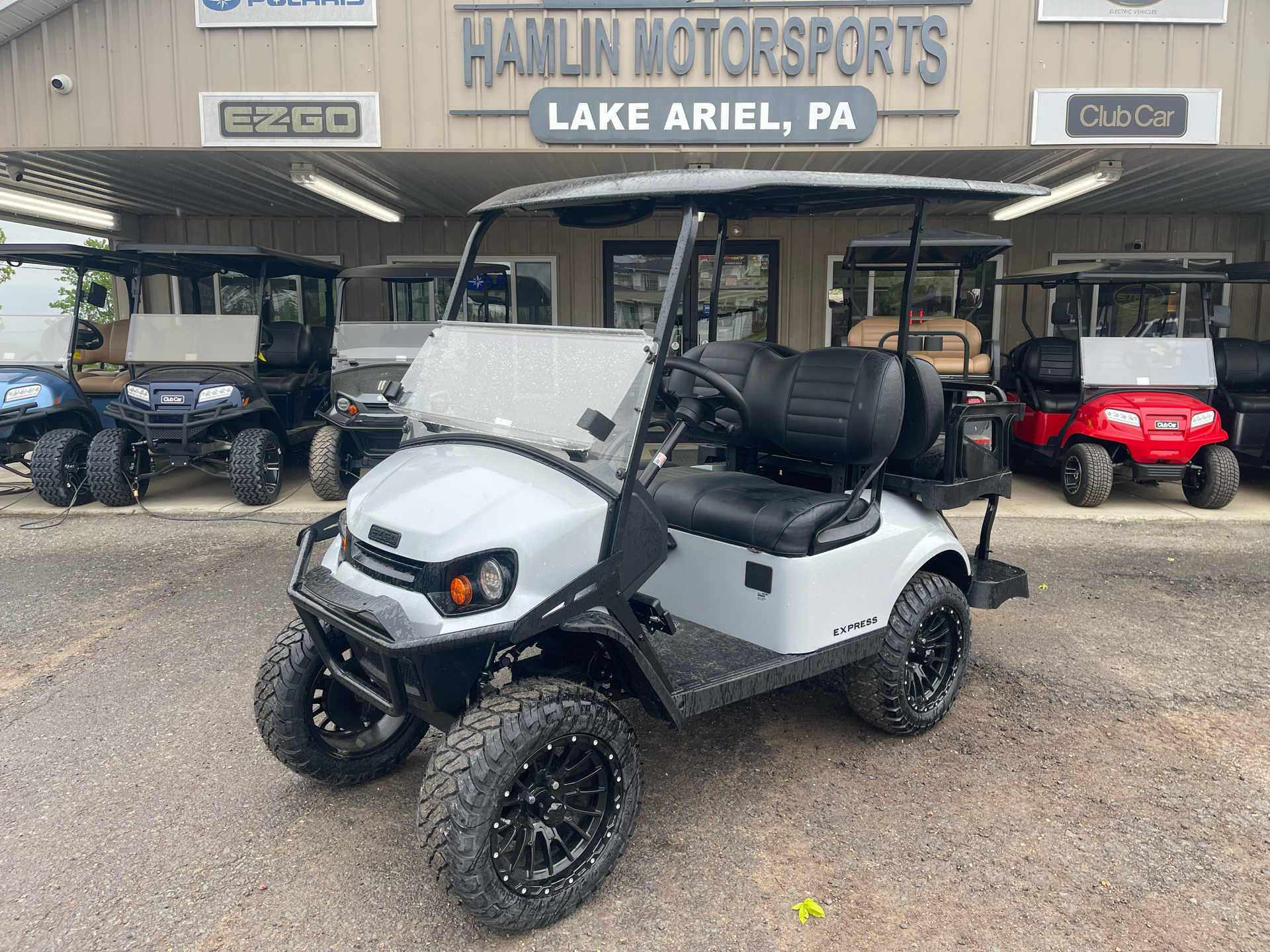 New 2025 E-Z-GO Express 4 Gas Lifted Bright White | Golf Carts in
