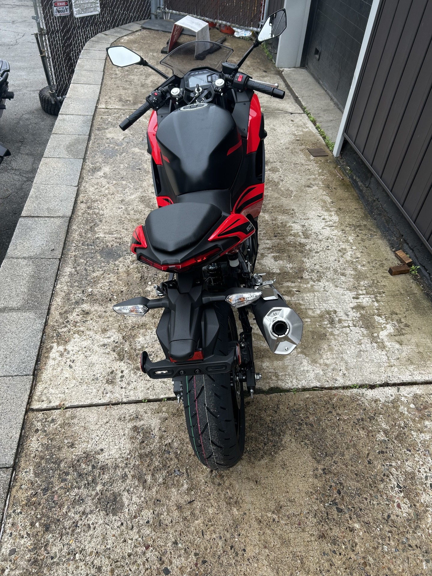 New 2025 Kawasaki Ninja 500 ABS Passion Red / Metallic Flat Spark