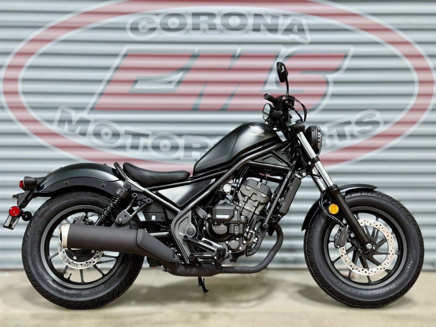 2026 Honda Rebel 300 E-Clutch in Matte Black Metallic — front three-quarter view