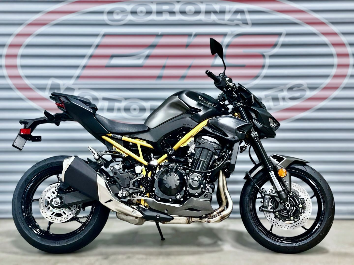 2026 Kawasaki Z900 ABS in Metallic Matte Graphenesteel Gray / Metallic Flat Spark Black — front three-quarter view