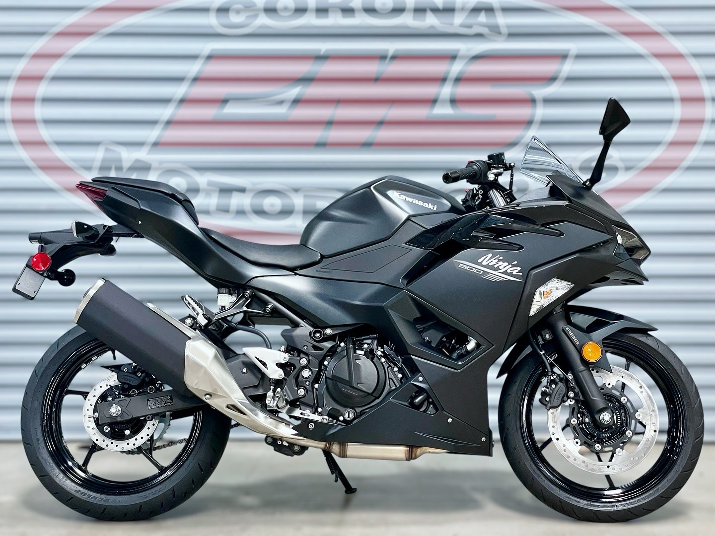 2026 Kawasaki Ninja® 500 ABS in Metallic Flat Spark Black / Metallic Spark Black — front three-quarter view
