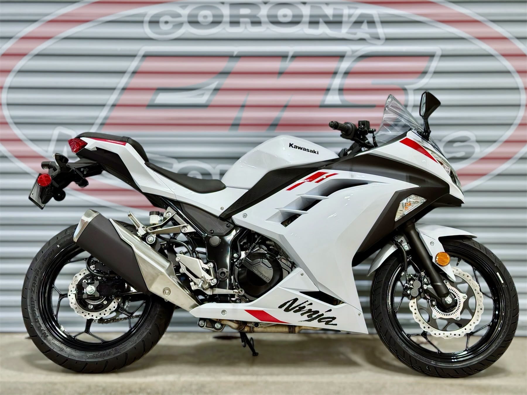 2026 Kawasaki Ninja® 300 ABS in Pearl Blizzard White — front three-quarter view