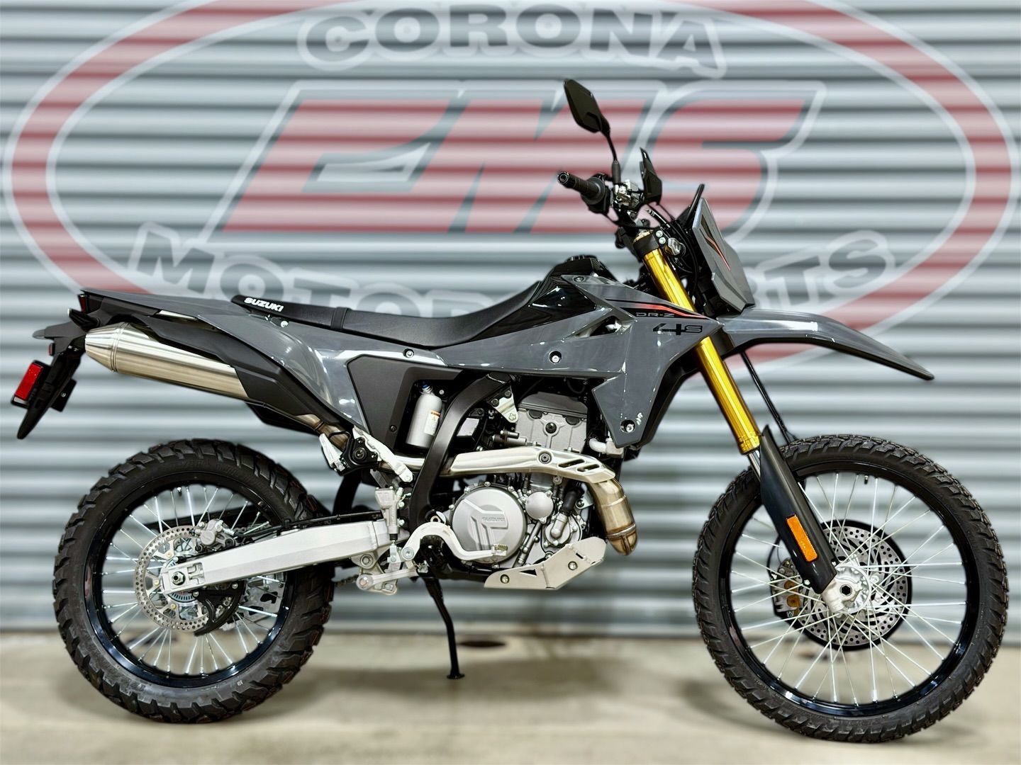 2026 Suzuki DR-Z4S+ in Solid Iron Gray — front three-quarter view