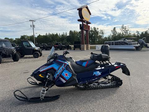 2020 Polaris 850 INDY ADVENTURE 137 - BLU/BLK-BLU-RAW-PIDD — photo 1 of 12