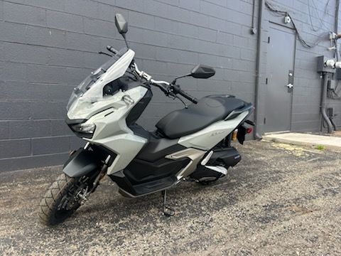 2026 Honda ADV160 in Pearl Smoky Gray — front three-quarter view