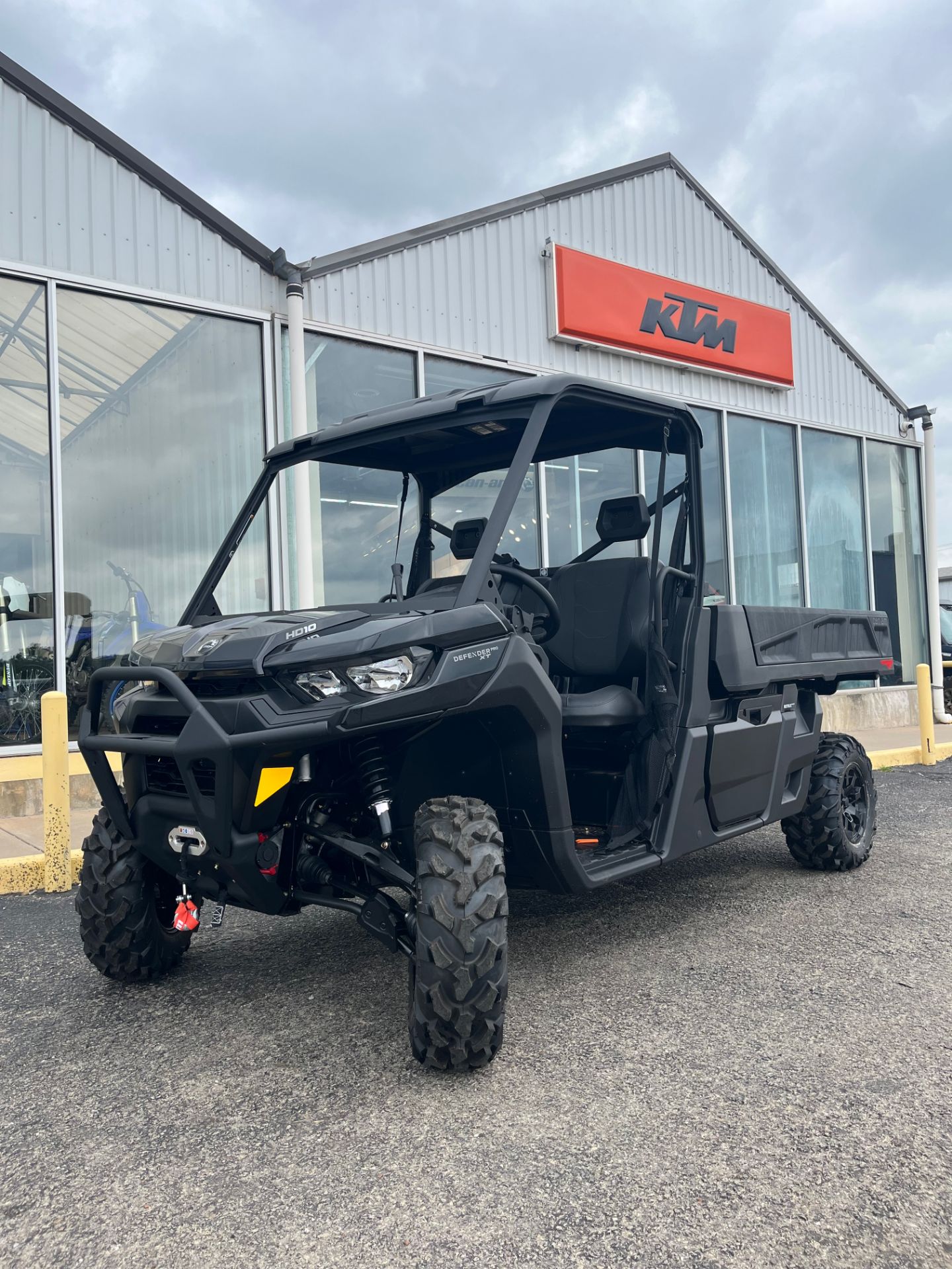 2026 Can-Am Defender PRO XT in Stealth Black — front three-quarter view