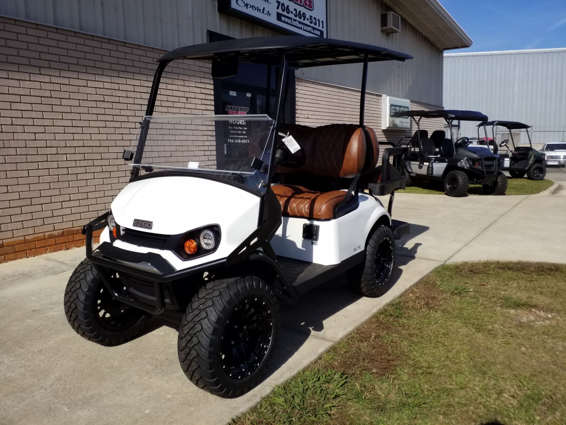 New 2025 E-Z-GO Express 4 Gas Lifted Golf Carts in Covington, GA