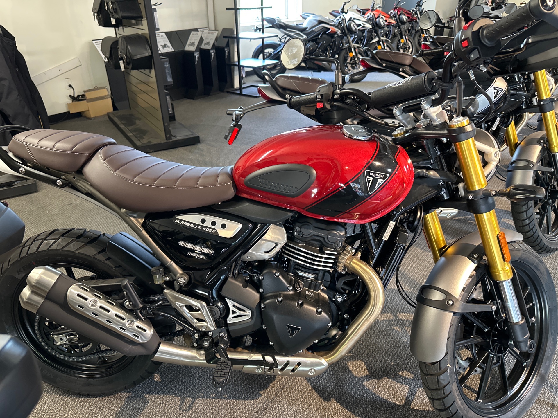 New 2025 Triumph Scrambler 400 X Carnival Red / Phantom Black