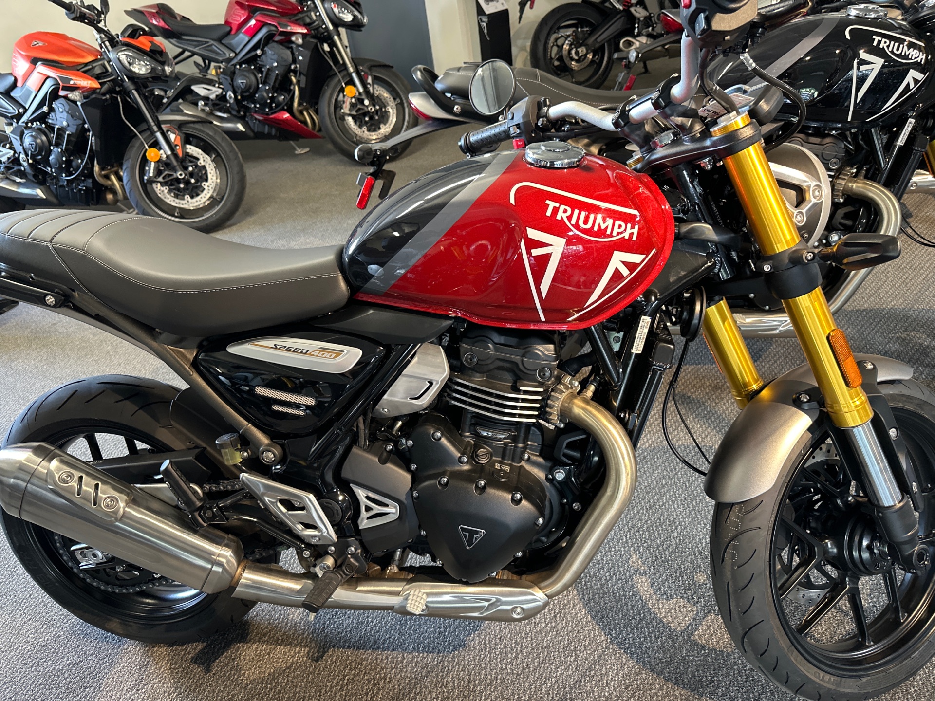 New 2025 Triumph Speed 400 Carnival Red / Storm Grey | Motorcycles