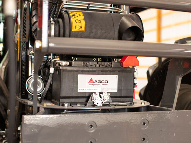MF Massey Ferguson 6718S working hard in front of the Slurry