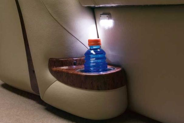 Floor-level drink holders and courtesy LED lights at the lounges are convenient and classy. - Photo 5