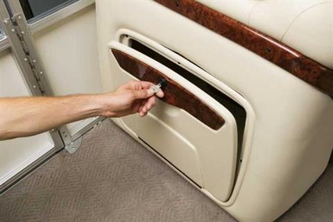 Keep gear safe and secure in the lockable storage compartment on the side of the lounge. - Photo 6